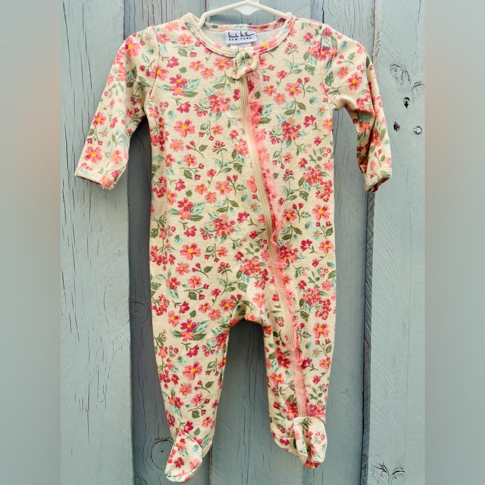 Cute as a ruffle. Worn only once. 6-9 months one price